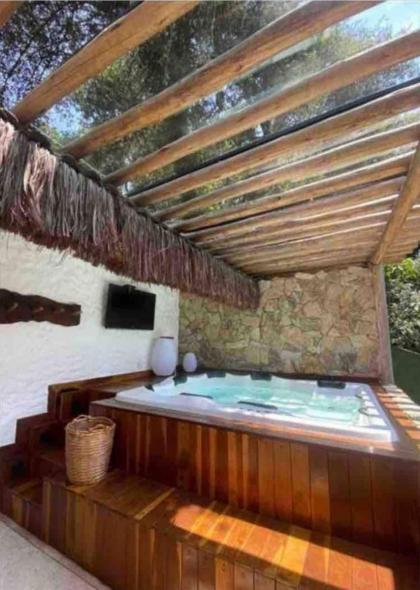 Chalét-Casa e Bangalo- Villa-Jacuzzi-Sauna-Lareira-Privativo - image 15